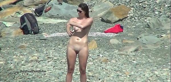  Cute young teen nudists on the beach